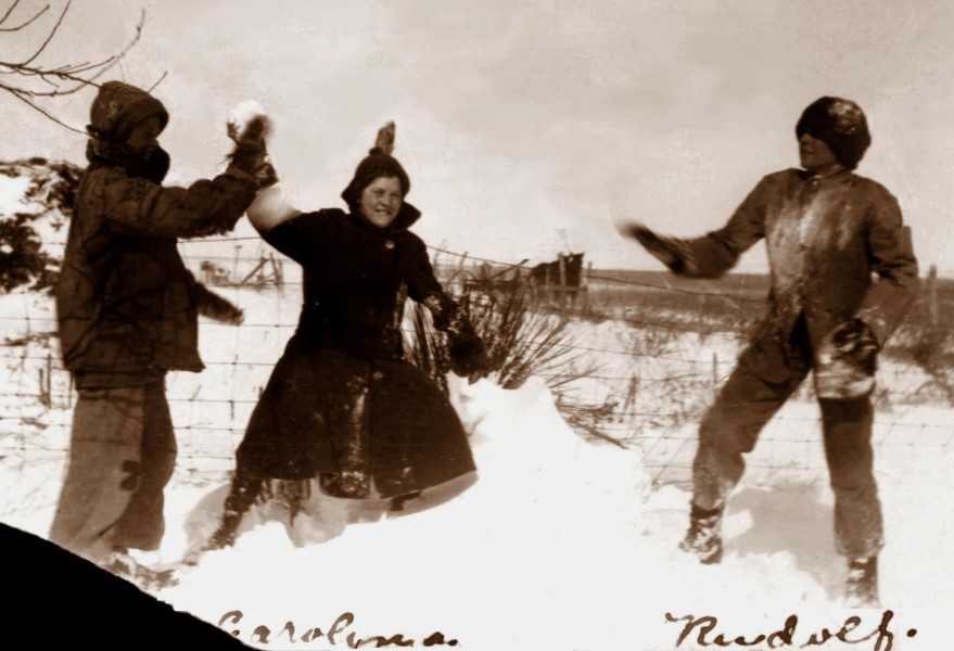 Herman, Caroline, and Rudi have a snow fight on the farm near Abernathy, c. 1921